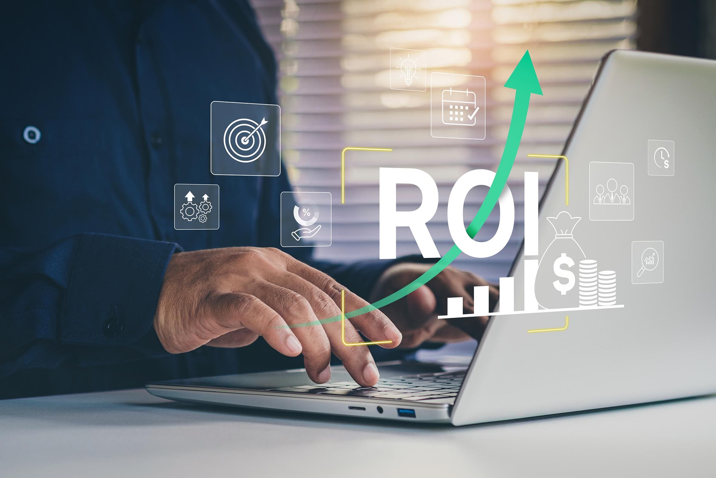 Person analyzing ROI on laptop